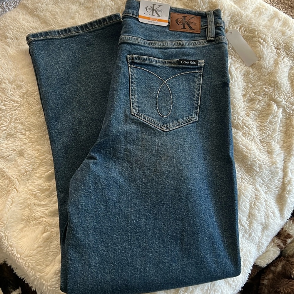 Calvin Klein high rise straight leg jeans. Color is Bedford. Sz 12